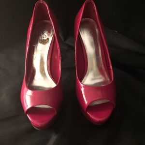 Size 6 peek toe pink pump.